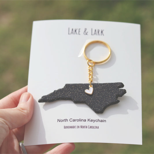 black gold glitter north carolina keychain