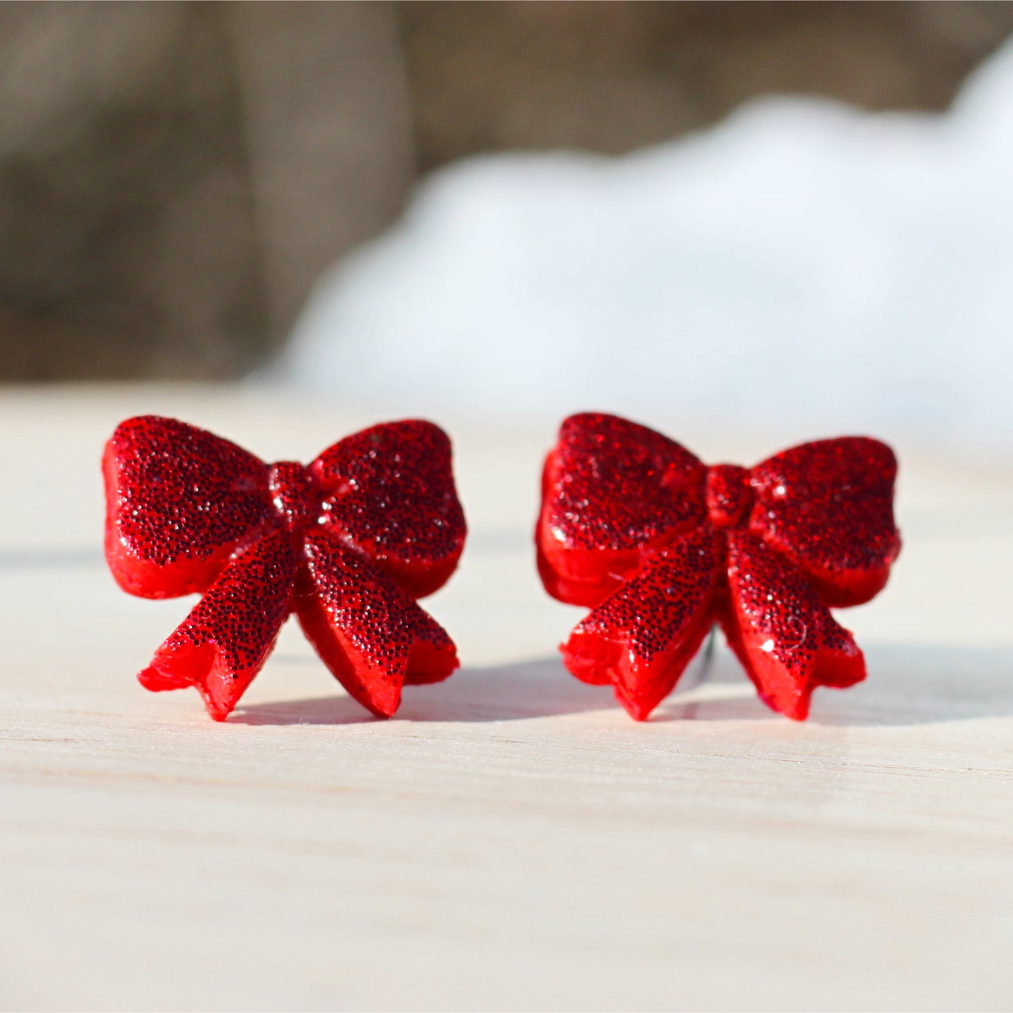 red glitter bow stud earrings