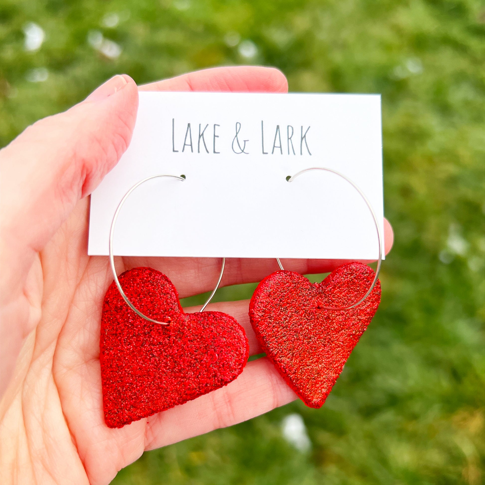 red glitter heart hoop earrings