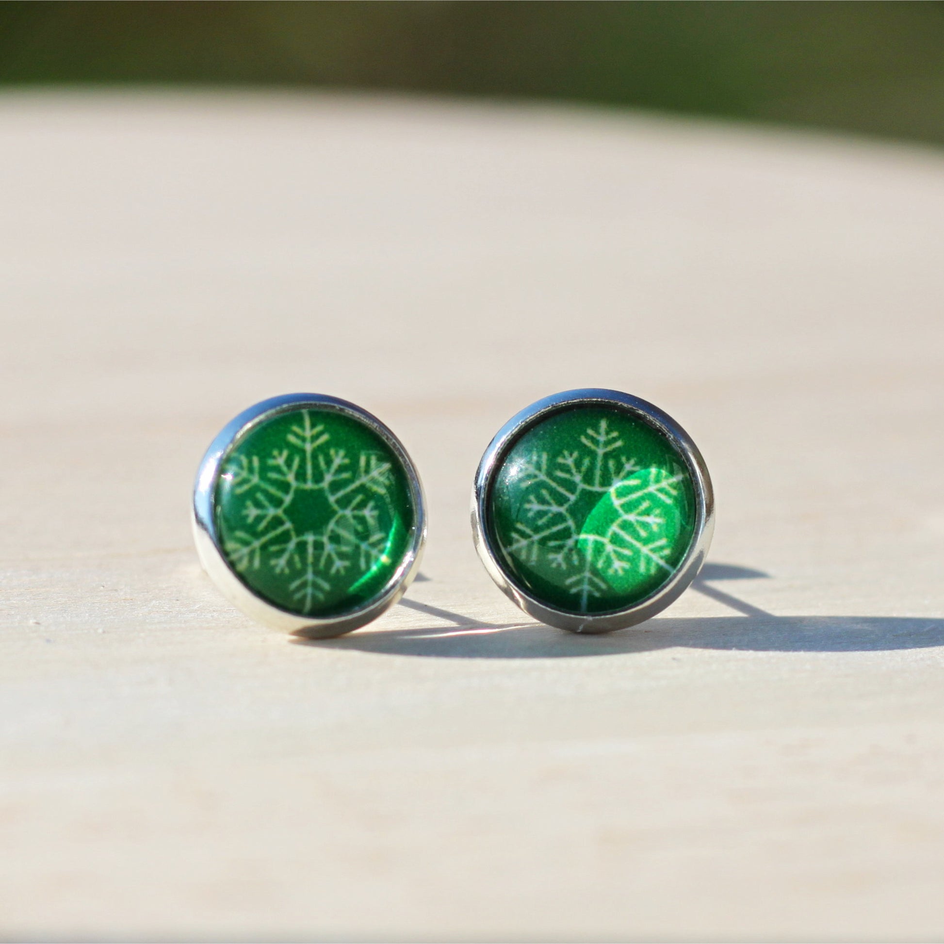 green snowflake winter stud earrings