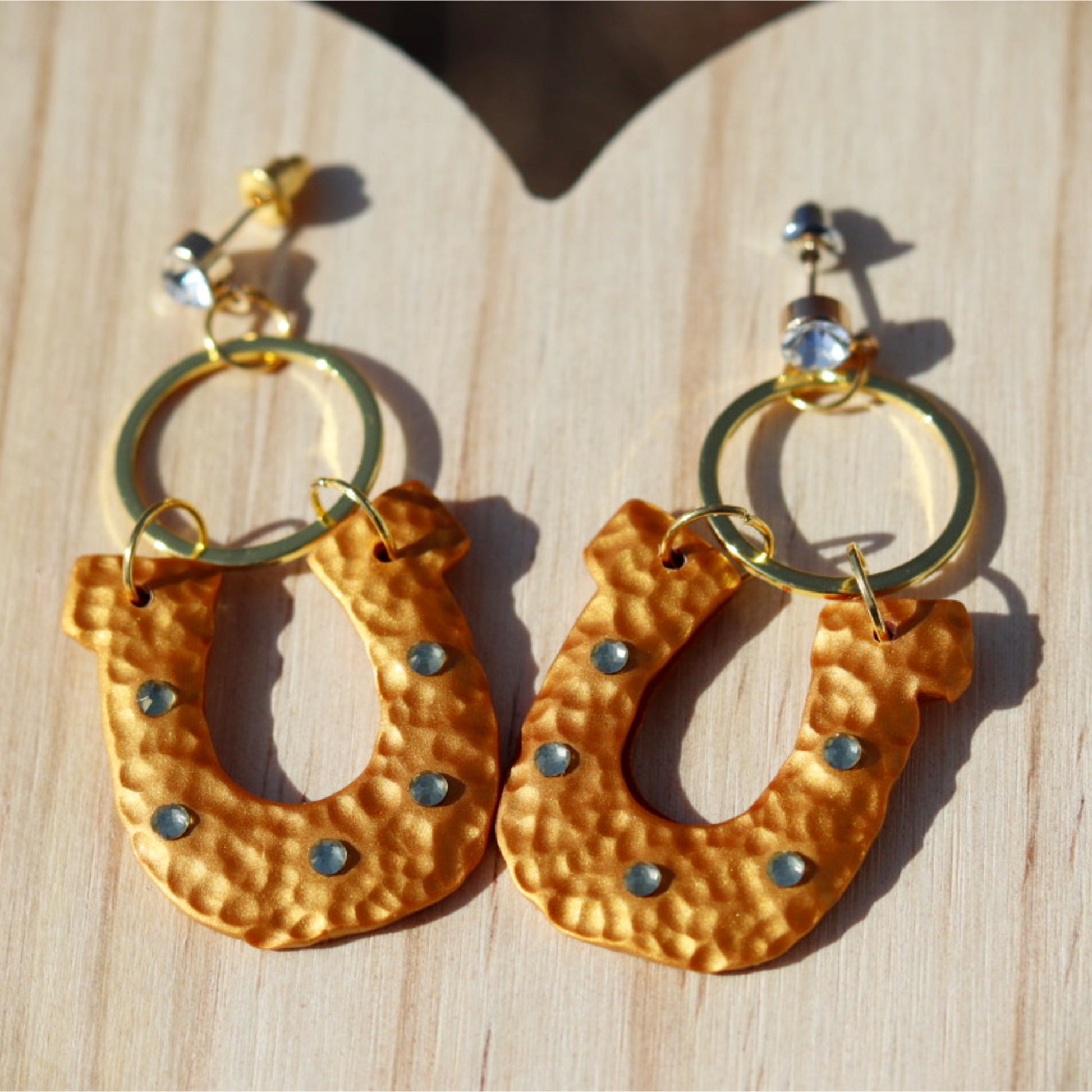 hammered gold lucky horseshoe rhinestone clay earrings lake lark