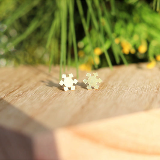 tiny gold snowflake stud earrings