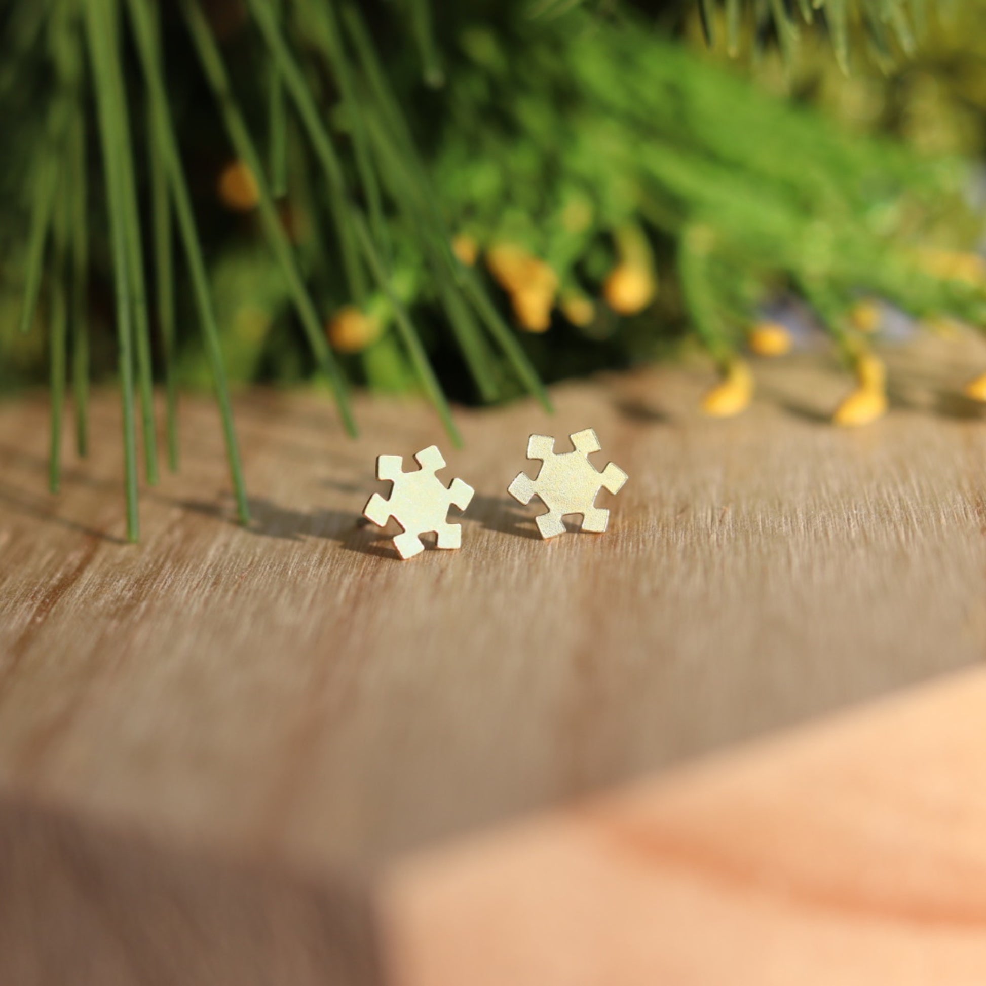 tiny gold snowflake stud earrings